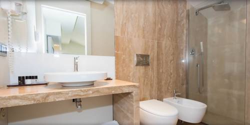 Imagen de la habitación del Hotel Romano House. Foto 4