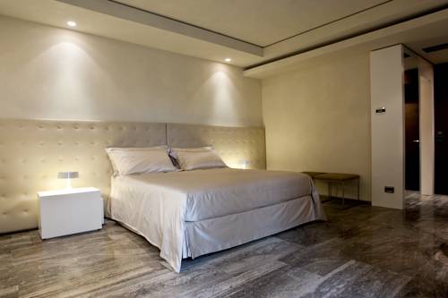 Imagen de la habitación del Hotel Romano House. Foto 5