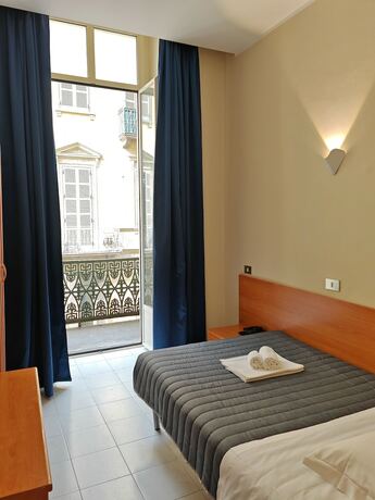 Imagen de la habitación del Hotel Romano, Turín. Foto 16