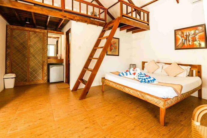 Imagen de la habitación del Hotel Romantic Beach Villas. Foto 20