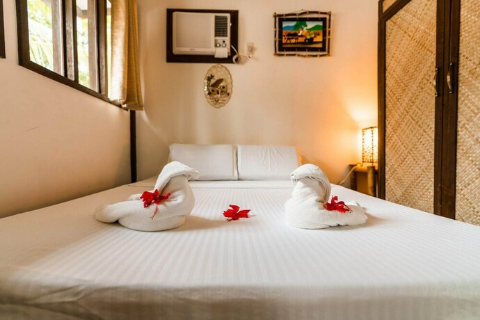 Imagen de la habitación del Hotel Romantic Beach Villas. Foto 22