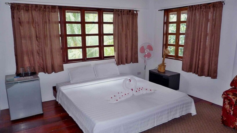 Imagen de la habitación del Hotel Romantic Beach Villas. Foto 24