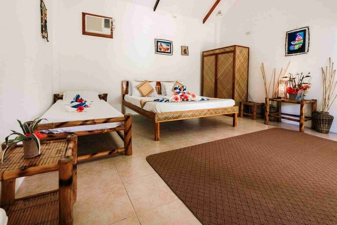 Imagen de la habitación del Hotel Romantic Beach Villas. Foto 26