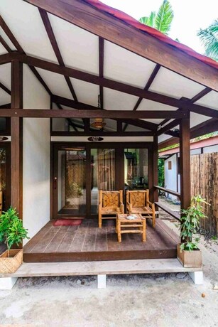 Imagen de la habitación del Hotel Romantic Beach Villas. Foto 27