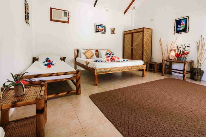 Imagen de la habitación del Hotel Romantic Beach Villas. Foto 33