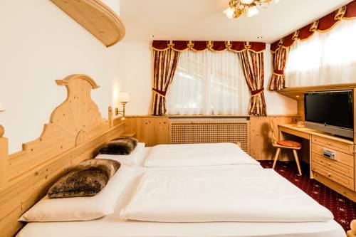 Imagen de la habitación del Hotel Romantic and Family Gardenia. Foto 6