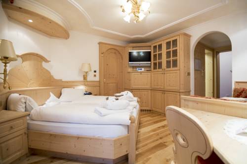 Imagen de la habitación del Hotel Romantic and Family Gardenia. Foto 11