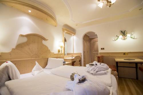 Imagen de la habitación del Hotel Romantic and Family Gardenia. Foto 15