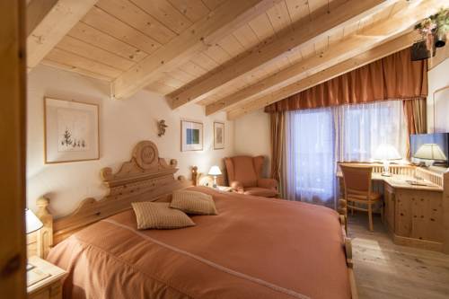 Imagen de la habitación del Hotel Romantik Arthotel Cappella. Foto 4