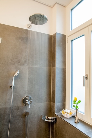 Imagen de la habitación del Hotel Romantik Beau Rivage. Foto 10