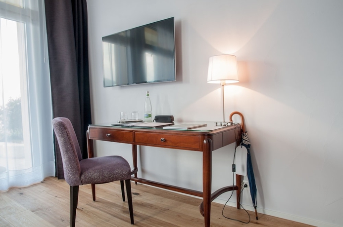 Imagen de la habitación del Hotel Romantik Beau Rivage. Foto 17