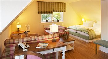 Imagen de la habitación del Hotel Romantik Fuchsbau. Foto 11