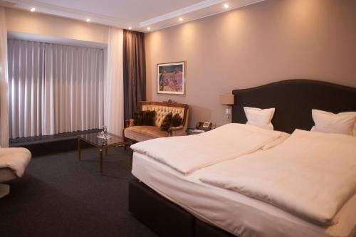 Imagen de la habitación del Hotel Romantik Goldener Karpfen. Foto 9