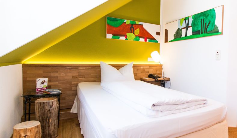Imagen de la habitación del Hotel Romantik Hirschen. Foto 11