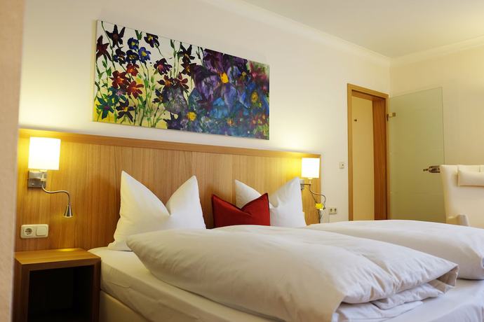 Imagen de la habitación del Hotel Romantik Hirschen. Foto 12