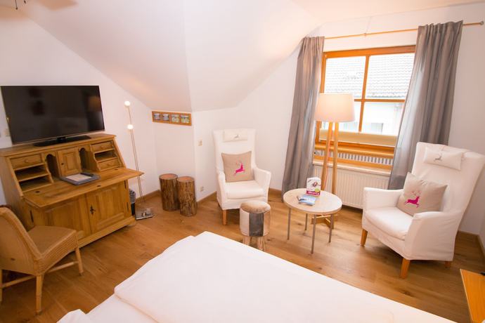 Imagen de la habitación del Hotel Romantik Hirschen. Foto 14