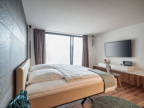 Imagen de la habitación del Hotel Romantik Hirschen. Foto 15