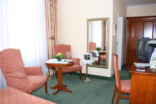 Imagen de la habitación del Hotel Romantik Hotel Aquarium.. Foto 4