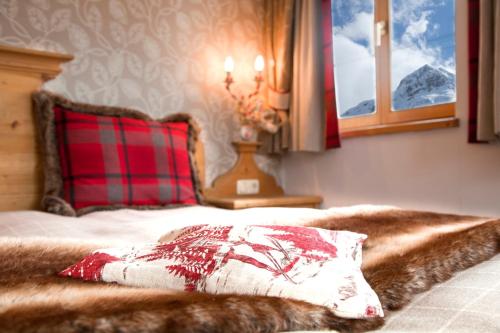 Imagen de la habitación del Hotel Romantik Hotel Die Krone von Lech. Foto 7