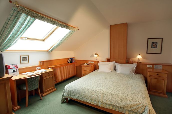 Imagen de la habitación del Hotel Romantik Hotel im Weissen Rössl am Wolfgangsee. Foto 18