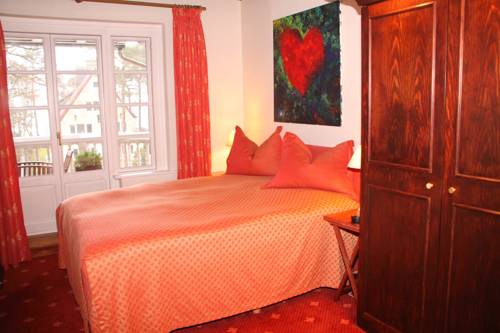 Imagen de la habitación del Hotel Romantik Im Villa Röhl. Foto 11