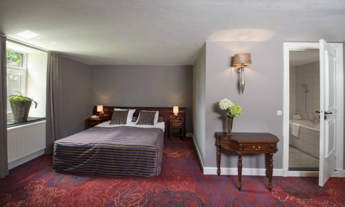 Imagen de la habitación del Hotel Romantik Kasteel Daelenbroeck. Foto 5