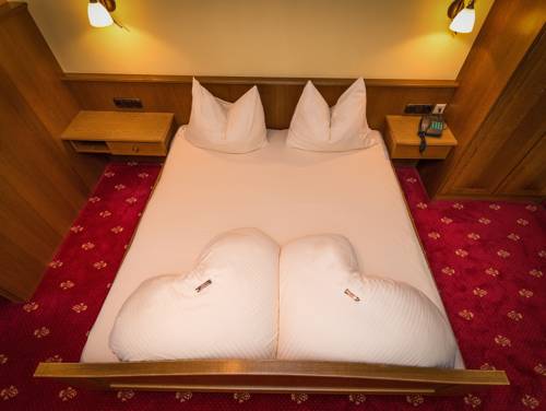 Imagen de la habitación del Hotel Romantik Krone. Foto 10