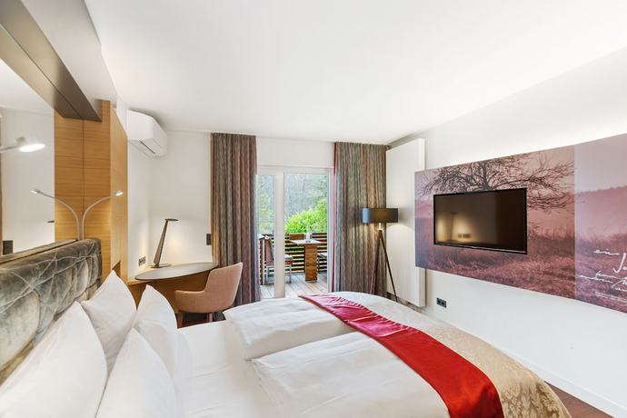 Imagen de la habitación del Hotel Romantik Landschloss Fasanerie. Foto 6