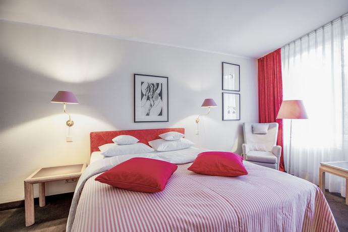 Imagen de la habitación del Hotel Romantik Landschloss Fasanerie. Foto 14
