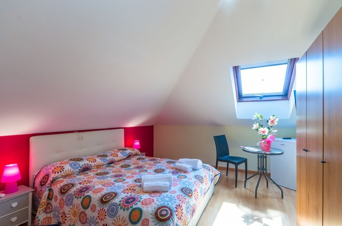 Imagen de la habitación del Hotel Romantik, Lignano Sabbiadoro. Foto 8