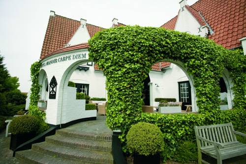 Imagen de la habitación del Hotel Romantik Manoir Carpe Diem. Foto 2