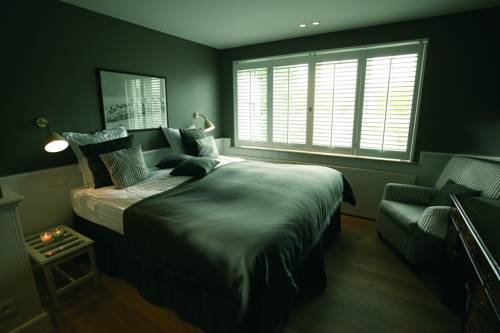 Imagen de la habitación del Hotel Romantik Manoir Carpe Diem. Foto 5