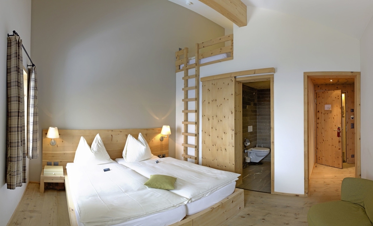 Imagen de la habitación del Hotel Romantik Muottas Muragl. Foto 15
