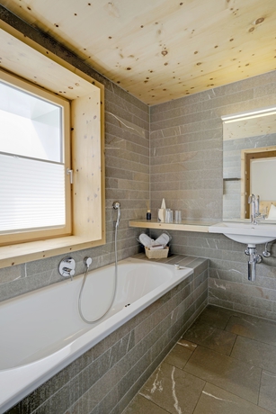Imagen de la habitación del Hotel Romantik Muottas Muragl. Foto 17