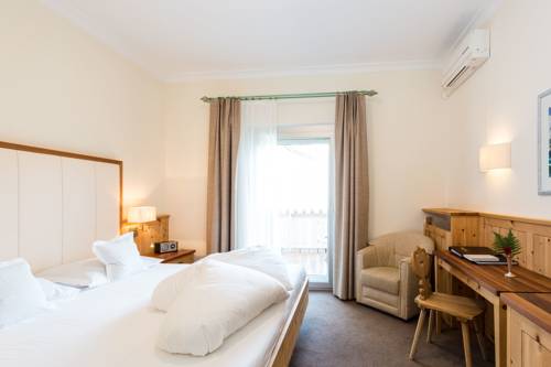 Imagen de la habitación del Hotel Romantik Oberwirt. Foto 9