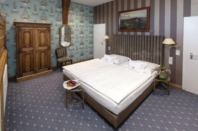 Imagen de la habitación del Hotel Romantik Parkhotel Wasserburg Anholt. Foto 7
