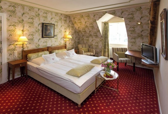 Imagen de la habitación del Hotel Romantik Parkhotel Wasserburg Anholt. Foto 10