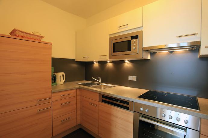 Imagen de la habitación del Hotel Romantik Residenz Ferienwohnungen Hotel Im Weissen R&ouml;ssl. Foto 4