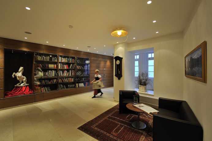 Imagen de los interiores del Hotel Romantik Residenz Ferienwohnungen Hotel Im Weissen R&ouml;ssl. Foto 17