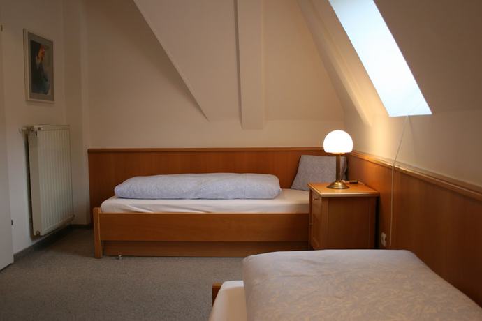 Imagen de la habitación del Hotel Romantik Residenz Ferienwohnungen Hotel Im Weissen R&ouml;ssl. Foto 10