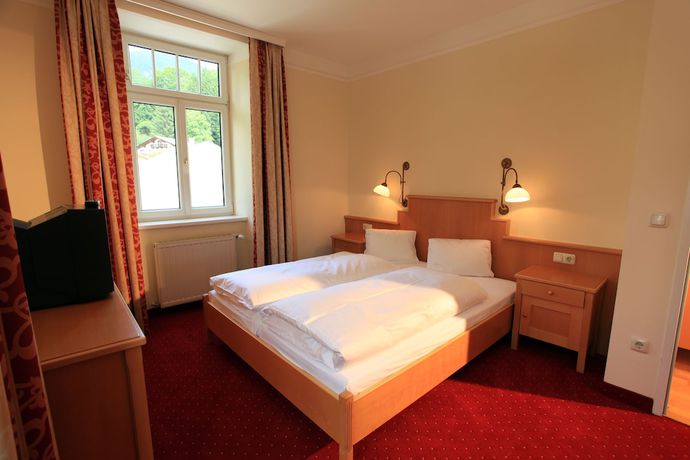 Imagen de la habitación del Hotel Romantik Residenz Ferienwohnungen Hotel Im Weissen R&ouml;ssl. Foto 11