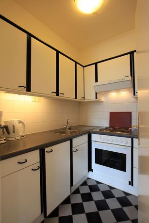 Imagen de la habitación del Hotel Romantik Residenz Ferienwohnungen Hotel Im Weissen R&ouml;ssl. Foto 13