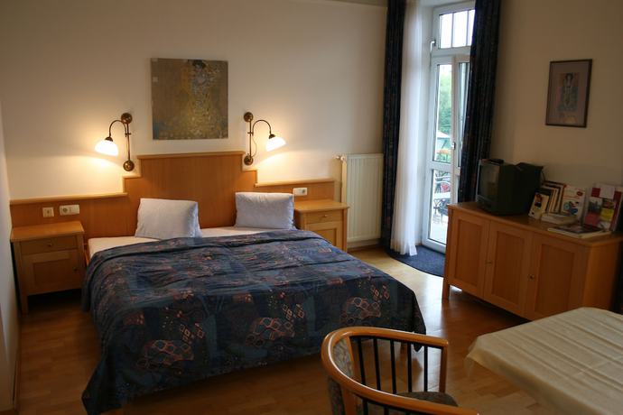 Imagen de la habitación del Hotel Romantik Residenz Ferienwohnungen Hotel Im Weissen R&ouml;ssl. Foto 14