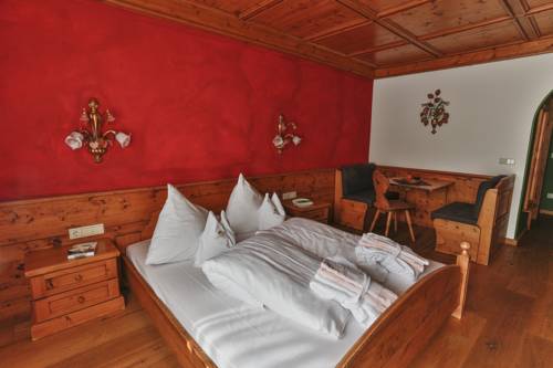 Imagen de la habitación del Hotel Romantik Santer. Foto 12
