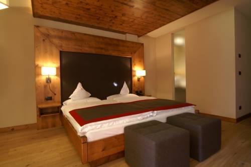 Imagen de la habitación del Hotel Romantik Santer. Foto 16