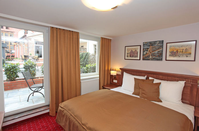 Imagen de la habitación del Hotel Romantik Scheelehof. Foto 11