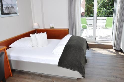 Imagen de la habitación del Hotel Romantik Schmiedegasthaus Gehrke. Foto 10