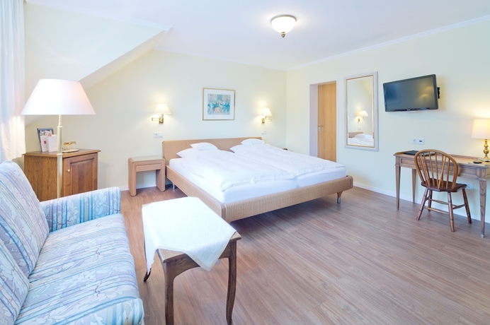 Imagen de la habitación del Hotel Romantik Waldhotel Mangold. Foto 2