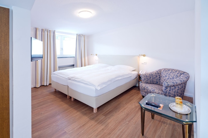 Imagen de la habitación del Hotel Romantik Waldhotel Mangold. Foto 3