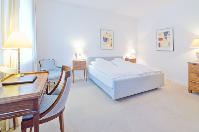 Imagen de la habitación del Hotel Romantik Waldhotel Mangold. Foto 7